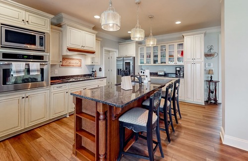 Riverwood Plantation Casa | Champions Retreat | Dog-friendly home with fireplace, grill, and sunny patio