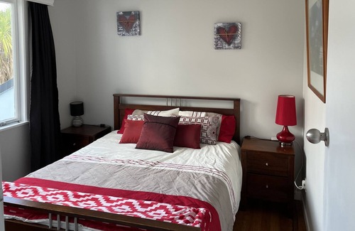 Onerahi Casa | Character home with beautiful land and sea views with stunning sunsets