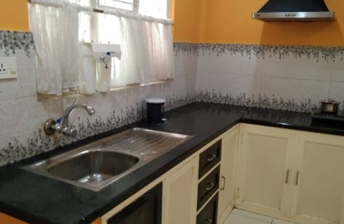 Kunnamkulam Cabaña | Charis Guest House 2 bed/1 bath near Guruvayur in Kunnamkulam