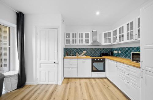 Faubourg North Apartamento | Charme & confort avec extérieur privatif en ville