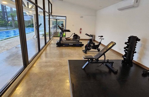 Barrio Los Villalobos Apartamento | Charming 2-bedroom apartment with WiFi, AC, fitness room and coworking space