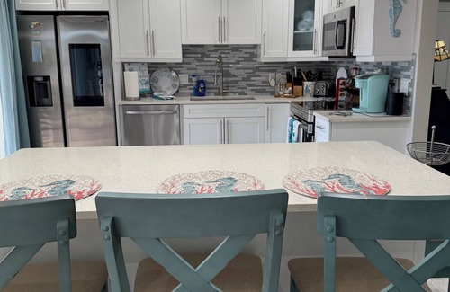 Isles of Capri Casa | Charming 2-bedroom house with Pool and Boat Dock on canal. Bring or rent a boat