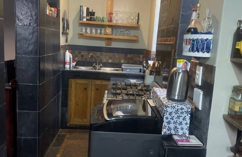 Greater Johannesburg Metropolitan Area Casa | Charming 2-bedroom house with fitness room and AC in lovely Johannesburg