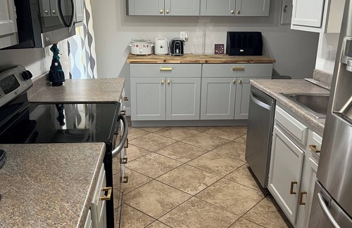 Montgomery Village Casa | Charming 4-bedroom house in Gaithersburg with WiFi and AC and fenced in yard!