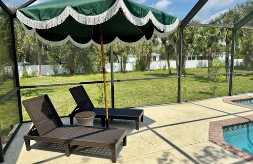 Joel Casa | Charming 4-bedroom house in enchanting Lehigh Acres with an amazing pool!