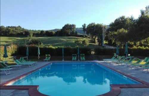 Caprese Michelangelo Apartamento | Charming apartment in Caprese Michelangelo, shared pool.