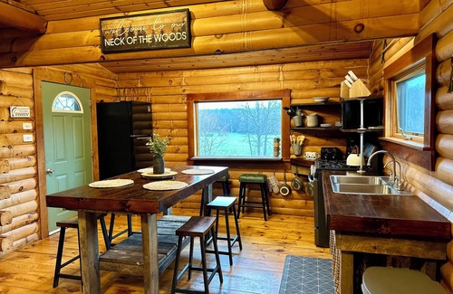 Coshocton Cabina | Charming Cabin Getaway with Pond, Kayaks + Creek