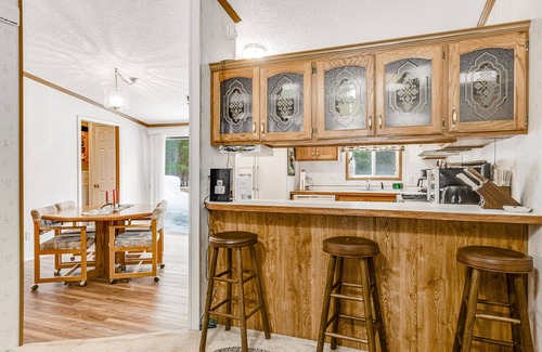 Boulder Junction Casa | Charming home with gas grill, full kitchen, deck, patio, TV, and washer/dryer
