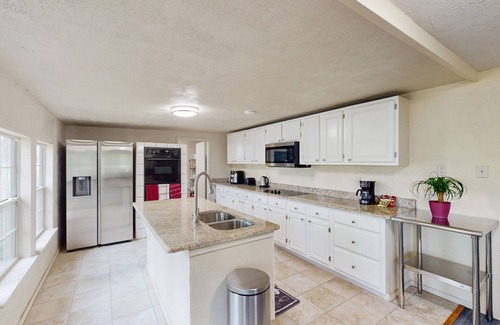 Quinlan Casa | Charming home with a private fishing pond, pool table, beautiful views, WFH desk