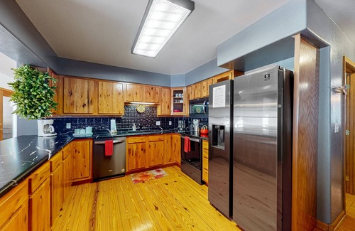 Lead Casa | Charming home with mountain view, private hot tub, deck, & two kitchens