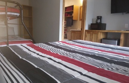 Hemphill Hotel | Charming remodeled motel room in Hemphill with Wi-Fi, mini fridge & microwave.