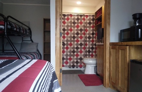 Hemphill Hotel | Charming remodeled motel room in Hemphill with Wi-Fi, mini fridge & microwave.