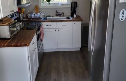 Riverhead Casa | Charming Riverhead home with large outdoor patio & backyard firepit