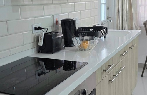 Oistins Apartamento | Charming studio in quiet, adorable location in Christ Church with WiFi, AC & TV