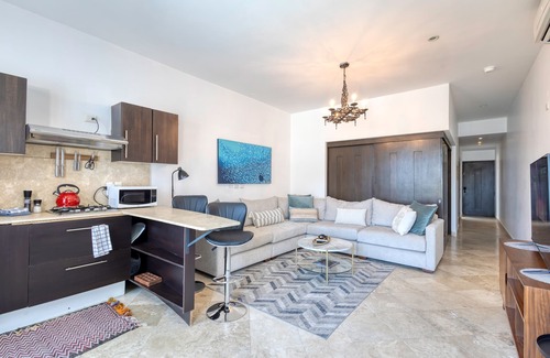 Libertad Apartamento | Charming & sunlit condo with pool & balcony - near golf, beaches, & nightlife