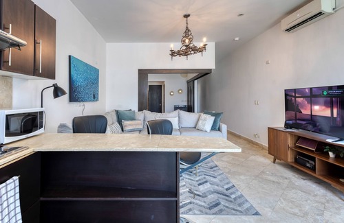 Libertad Apartamento | Charming & sunlit condo with pool & balcony - near golf, beaches, & nightlife