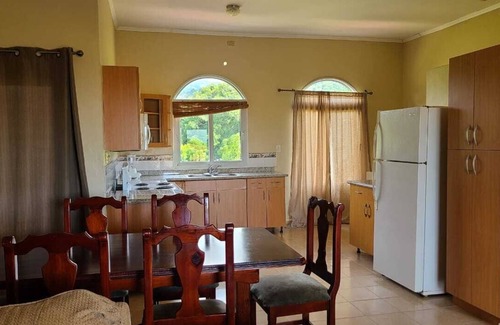Corozal Casa | Charming two storey 2-bedroom duplex villa with WiFi, AC in lovely Lucinda