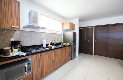 Díaz Ordaz Apartamento | Cheerful Condo, Mountainview Roof and Lounge