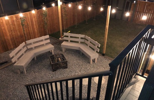 Red Deer Casa | Cheerful, cozy 4 bedroom house w/ hot tub and firepit area