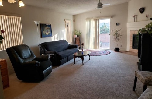 Westside Casa | Cheerful NM style home with indoor fireplace