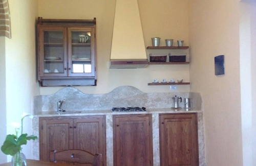 Bollano Casa | CIPRESSO APARTMENT in CASANOVA farmhouse on hills of Crete Senesi