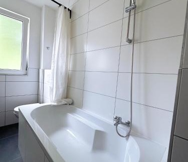 Frohnhausen Apartamento | City Apartment with WIFI, Kitchen and 4K TV