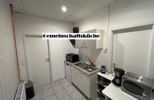Neumuenster Apartamento | City Apartments direkt am Hauptbahnhof - Perfekt für Pendler und Monteure