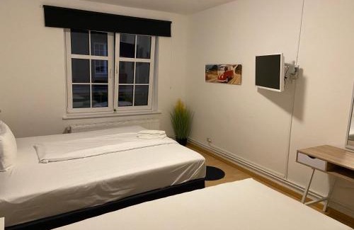 Neumuenster Apartamento | City Apartments direkt am Hauptbahnhof - Perfekt für Pendler und Monteure