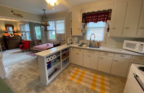 Markesan Cabaña | Classic Green Lake cottage, lakefront, screened boathouse deck, dock, swimming