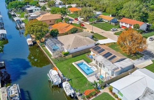 Fullers Earth Casa | Classy Cabana on the water, Private Heated Pool & Boat Lifts
