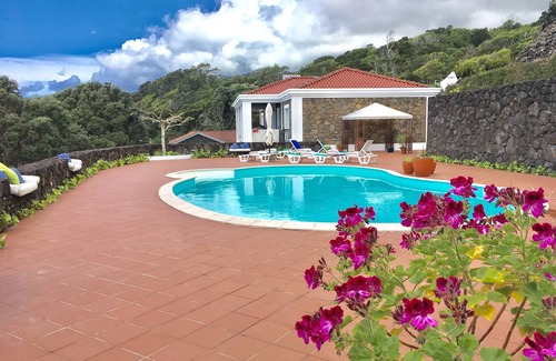 Pico Villa | Cliff-Top Villa frente al mar con jardines y piscina privada