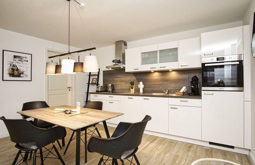 Lauterbach Apartamento | Close to the sailing harbor - Alte Fischfabrik Lauterbach FeWo 07 Relaxing in Lauterbach