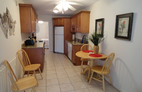 Ilexhurst Casa | Más cerca de la playa no funciona: cómodo apartamento a nivel del suelo en la playa.