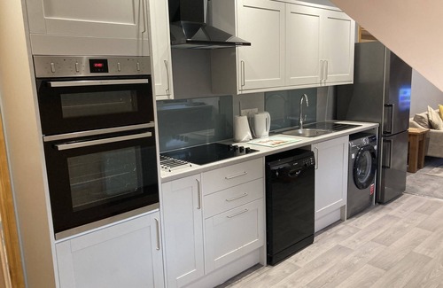 Grantham Apartamento | Apartamento-Ejecutivo-Baño privado con ducha-Vista al patio