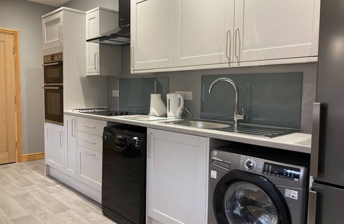 Grantham Apartamento | Apartamento-Ejecutivo-Baño privado con ducha-Vista al patio
