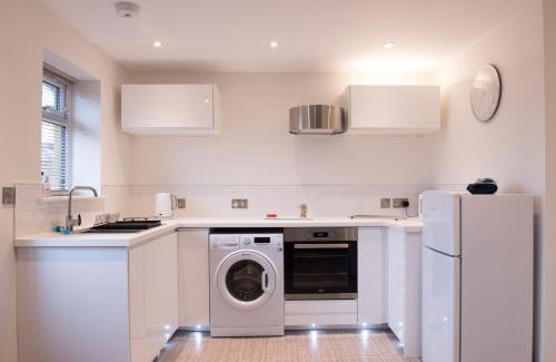 Beachampton Apartamento | Coach House