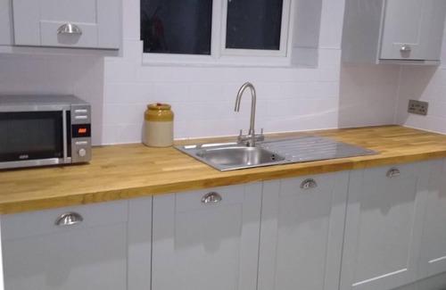 Peacehaven Casa | Cottage costera en un impresionante acantilado Top Ubicación