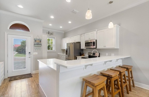 Sunset Pass Casa | Coastal Living Perfected: Banana Bay's Intracoastal Retreat with Sandy Shores