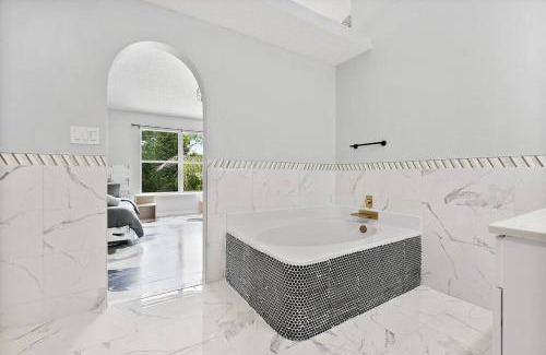 Palm Coast Casa | Coastal Retreat - Roomy, Relaxing, Heated Pool