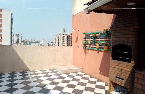 Vila Julia Apartamento | Cobertura com Churrasqueira própria e Wi-Fi perto da Praia - Excelente para Família e Amigos