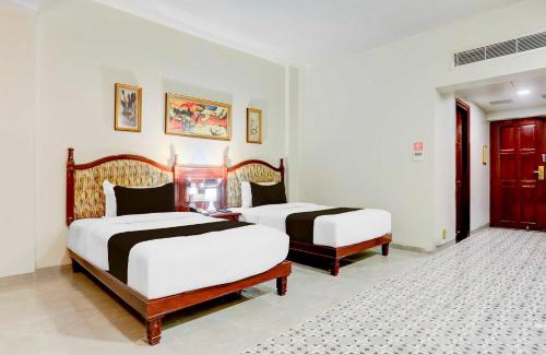 Anand Hotel | Collection O Gujarat Anand City Bus Station