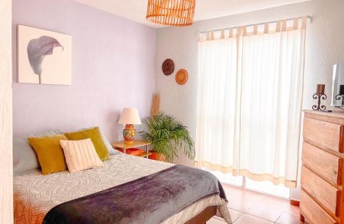 Barrio de La Presa Apartamento | Colorful family condo with terrace and free parking
