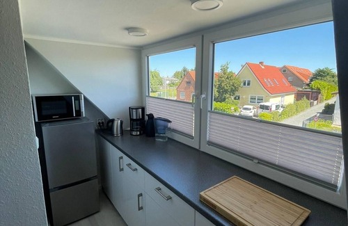 Landkirchen Apartamento | Comfortable apartment on Fehmarn with garden, fitness room and private parking space