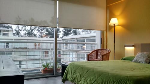 La Lonja Apartamento | CONCORD PILAR"313 Almendros"50m2 en Suite -living y dormitorio- de 1 a 4 huéspedes
