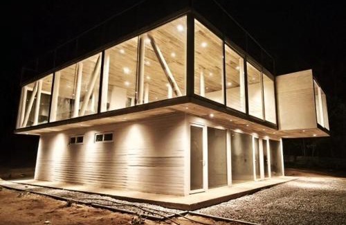 Tunquen Casa | Concrete house overlooking the ocean and beach access