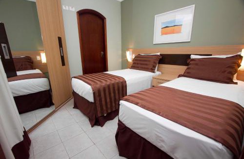 Gonzaga Apartamento | Cosmopolitan Praia Flat