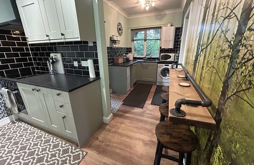 Ruskington Cabina | Cosy and secluded brook-side lodge