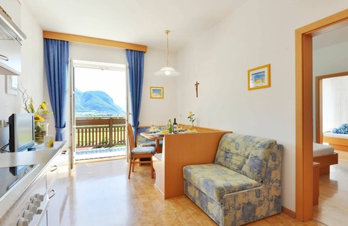 Andriano Apartamento | Acogedor apartamento para 4 personas con WIFI, piscina, TV y patio