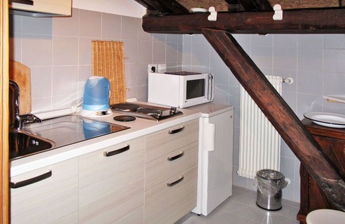 Vito d'Asio Apartamento | Acogedor apartamento para 4 personas con A/C, WIFI, piscina, TV, patio y mascotas permitida