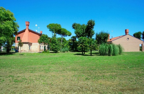Cavallino-Treporti Apartamento | Bonito apartamento para 8 personas con A/C, WIFI, TV y patio